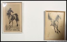 A pair of vintage Chinese watercolour prints of horses being framed and glazed.