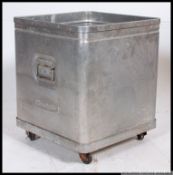A vintage Industrial metal ' Grundy bin ' school trolley on castors with carry handles - ideal as