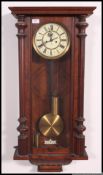 A 19th century Gustav Becker walnut large vienna regulator wall clock.