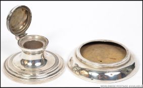 A silver hallmarked ink well with assay mark for Chester along with a silver hallmarked dish gross