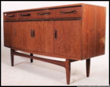 A 1970's G-Plan Fresco pattern teak wood sideboard.