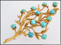 A stunning 18ct / 750 gold marked turquoise set ladies tree brooch.