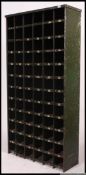 A vintage Industrial 20th century metal office green upright pigeon 72 hole stationary cubby