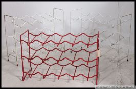 A collection of three vintage retro 1960's / 70's wire coated sectional wine racks / mug racks