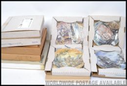 A collection of boxed collectors plates to include 4 Royal Worcester Churchill plates ,