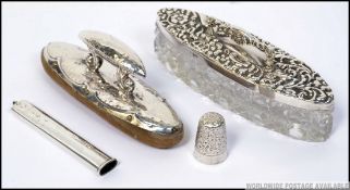 A collection of silver hallmarked items to include a silver thimble by James Fenton with assay
