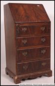 A good quality 20th century Queen Anne ladies walnut writing bureau desk.