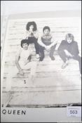 A vintage press photograph of Queen,