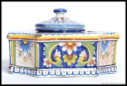 An Italian Faience ceramic inkwell, complete with inner well and lid.