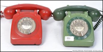 A pair of retro / vintage ring dial telephones.