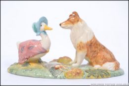 A Beswick Beatrix Potter figurine group Kep and Jemima P4091 1013/2000