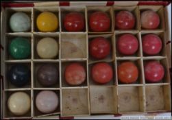 A fabulous Victorian cased set of composite snooker balls - billiard set in the original box.