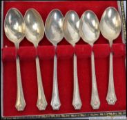 A cased set of 6 silver hallmarked spoons complete in the presentation box.