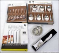 A collection of cased cutlery by Arthur Price along with some boxed Pewter items to include a