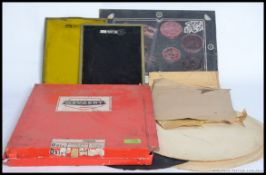 A collection of vintage retro collectable original advertising slides/plates for printers,