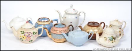 A collection of teapots to include 3 Victorian lustre examples, also Johnson Bros, Sadler,