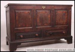An 18th century country oak mule chest coffer.