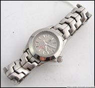 A ladies Tag Heuer Link limited Edition Tiger Woods stainless steel wristwatch.