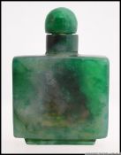 A Chinese oriental jade style painted perfume bottle