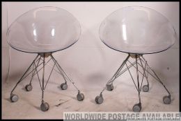 A Pair Eros Kartell Transparent Plastic Chairs, designed by Philippe Starck for Kartell,