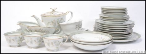 A retro 1970's Denby - Langley pottery dinner service comprising plates tureens etc