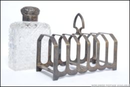 A silver hallmarked toast rack by Edward Viner. Hallmarks for Sheffield, date letter P, 1932.