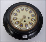 A 19th century oeil de boeuf French bullseye clock with ebonised surround,