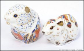 Two Crown Derby paperweights Bank Vole and Poppy Mouse both with gold stoppers