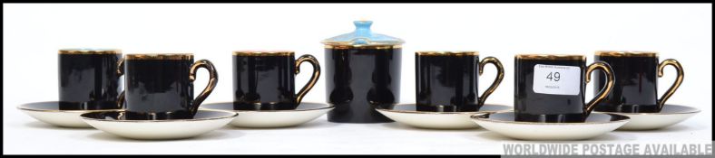 A set of six Palissey ' Madeleine ' coffee cans with matching saucers,