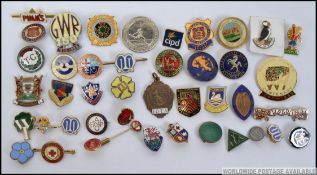 A large collection of enamel badges to include Butlins 1959, GWR, British Railwaymans Club Touring,