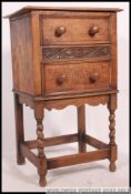 An early 20th century barley twist oak pedestal side cabinet.