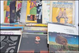 A collection of vinyl 45rpm singles to include The Heptones, Bob Marley, The Rolling Stones,