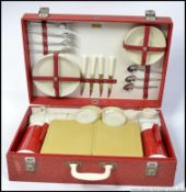 A four persons retro 1960's picnic hamper by Sirram,