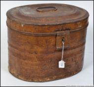 A Victorian tin hat box - luggage chest with hinged top bearing date lozenge mark to the base