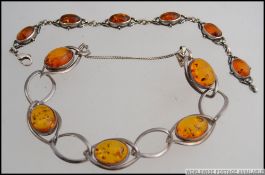 2 beautiful pair of ladies silver 925 and cabochon amber set bracelets having clasp locks,