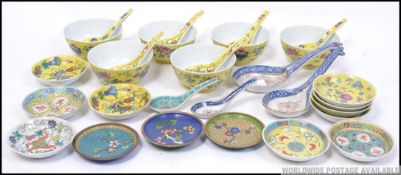 Chinese ceramics of famille juane form to include bowls and spoons along with other dishes and