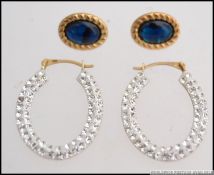 2 pairs of 9ct gold ladies earrings, One with blue cabochon stone centres,