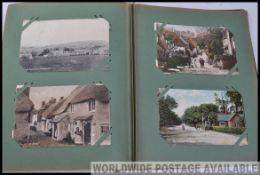 Edwardian slip-in album type with almost 300 circa 1910 picture postcards.