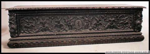 A stunning large 19th century chestnut and walnut continental believed Italian Baroque Cassone -
