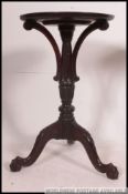 An early 20th century good quality tripod wine table.