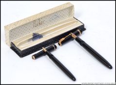 A 14k gold nib Parker Maxima fountain pen along with another Parker fountain pen also with a 14k