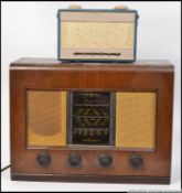 A retro vintage 1950's Cossor portable radio with decorative facia together with a large mid