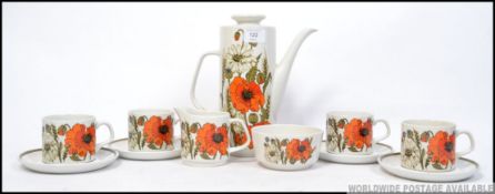A retro 1970's Alfred Meakin coffee service in the poppy pattern, consisting of cups, saucers,