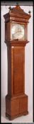 An 18th century eight day oak cased longcase / grandfather clock by John Thomas of Crewkerne.