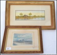Two framed and glazed water colours of Lake scenes the first signed F C Hines and the other being