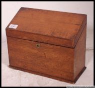 A Victorian oak desk top stationary cabinet.