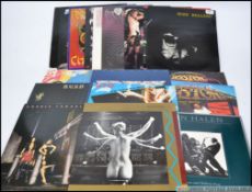 A collection of 1980's rock long play and 12