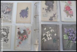 Vintage greetings postcards x 400 in album.