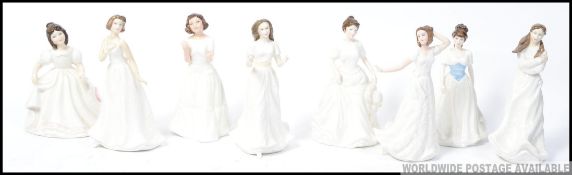 A collection of 8 Royal Doulton Figurines Embrace HN4258 , Melody HN4117 , Harmony HN4096 ,