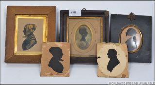 A 19th century reverse silhouette on glass panel painting being framed and glazed.